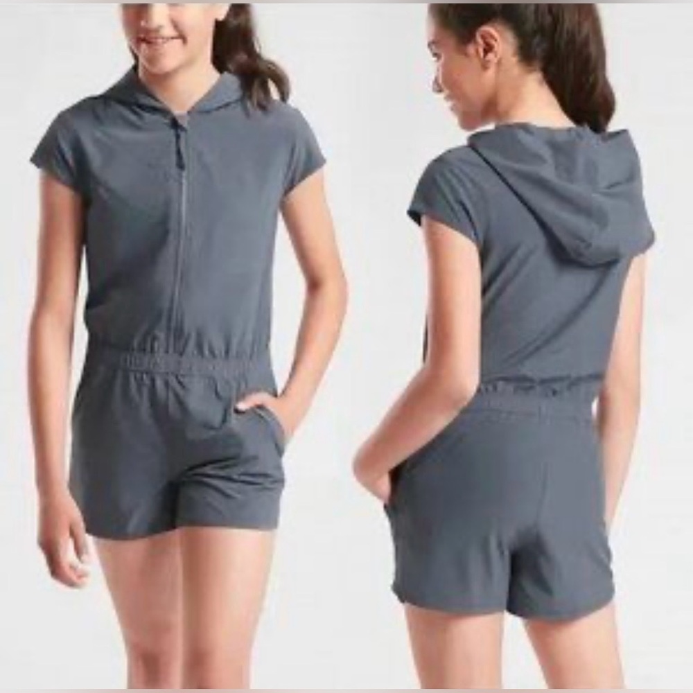 Athleta Girl Romper, slate grey color, size L (12)
hooded, 1/2 zip closure